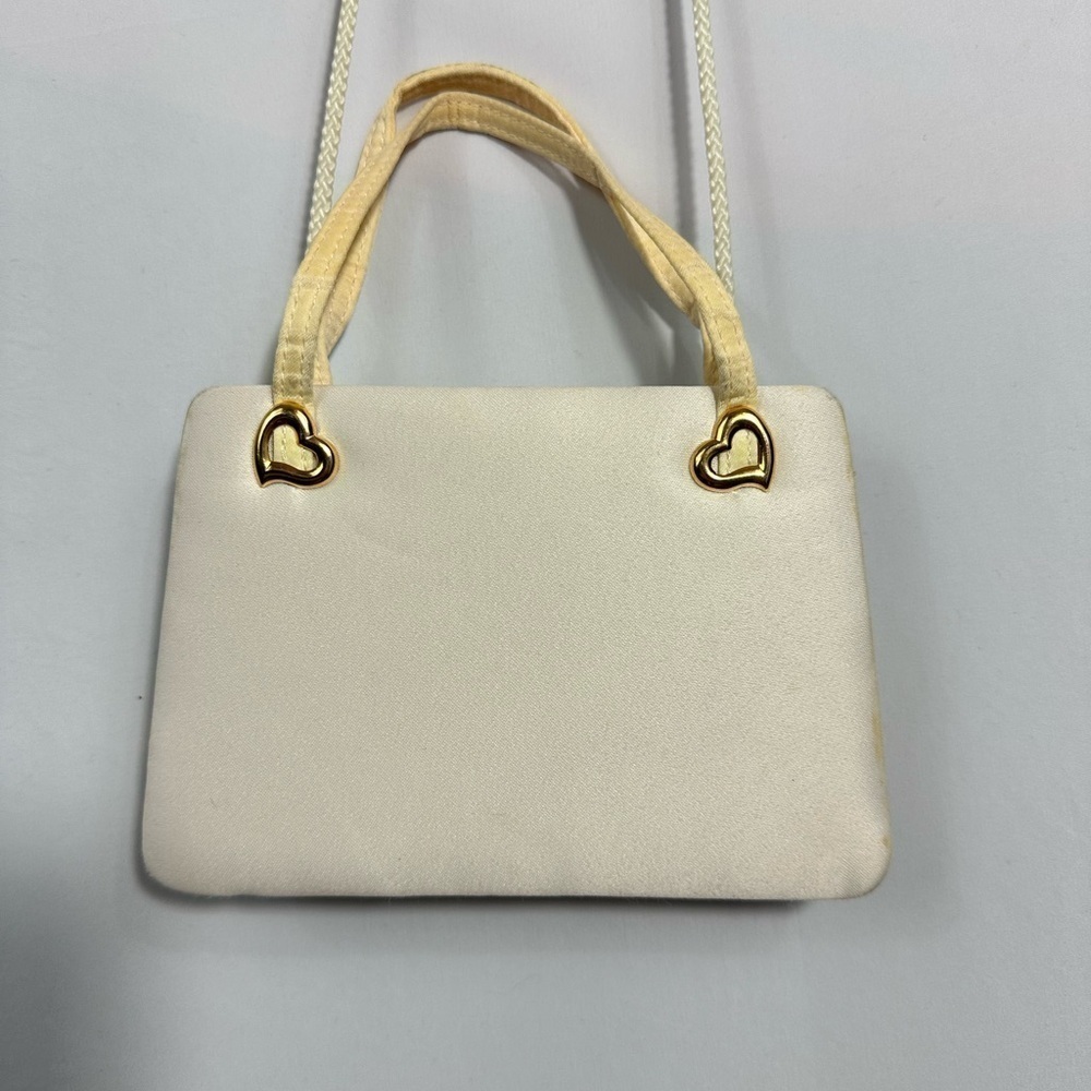Y2K Victoria's Secret cream square bag with gold heart details